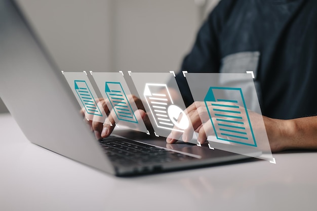 paperless-quality-assurance-process-by-hand-using-laptop-computer-with-virtual-screen-document-erp-management-concept-online-approval_27634-1412